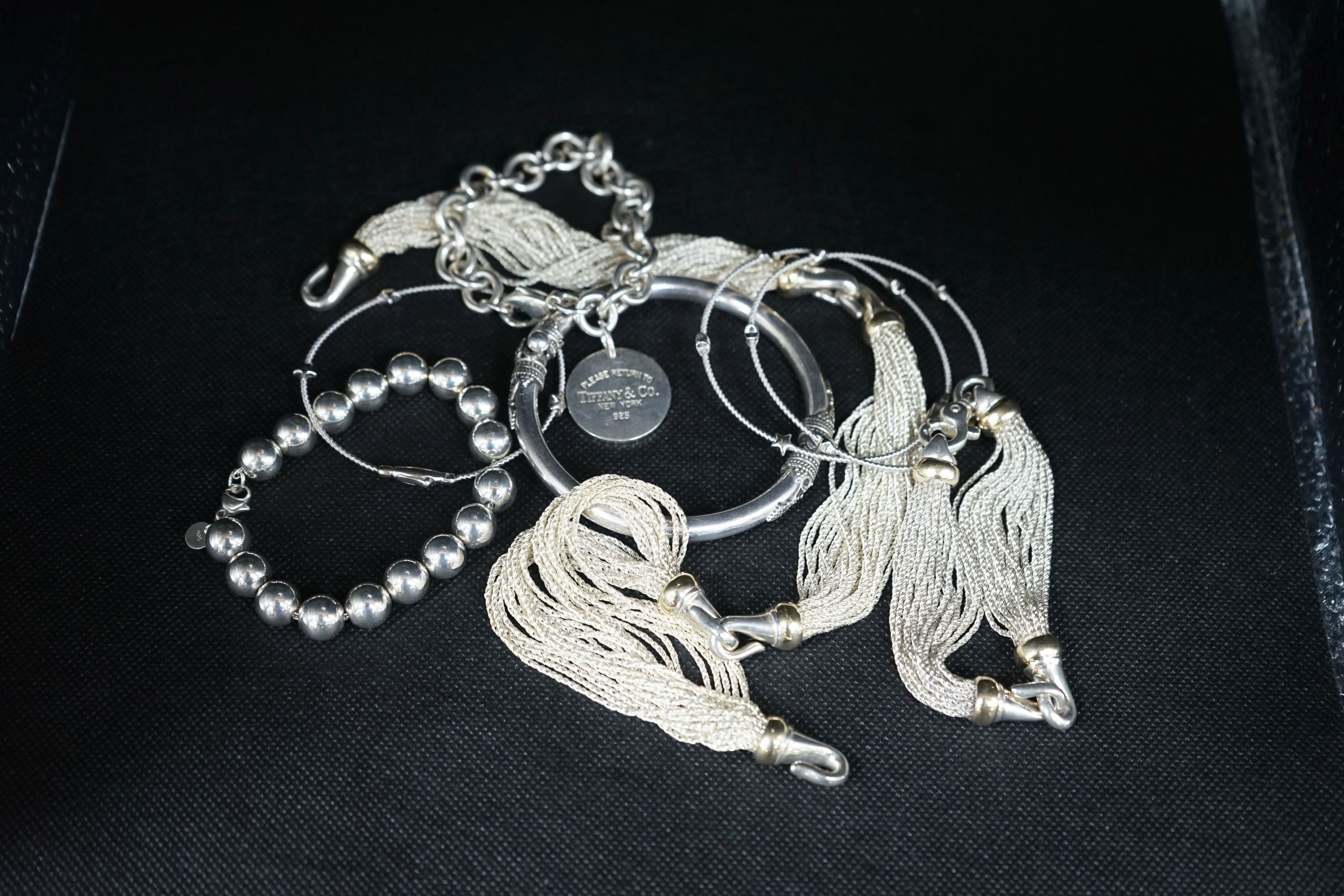 A small group of white metal and 925 jewellery including torsade necklace and bracelet, etc